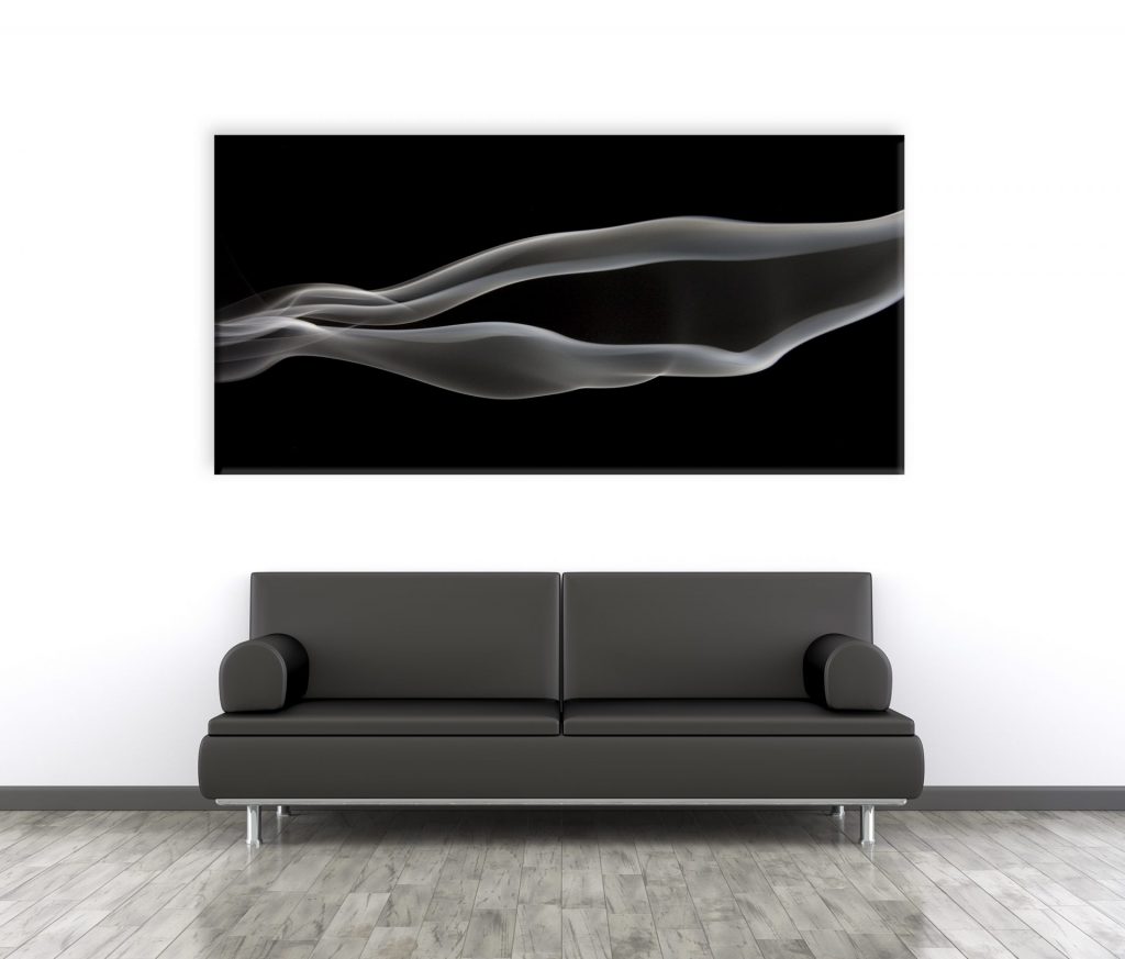 Fine art photography displayed, Smoke image above a black couch